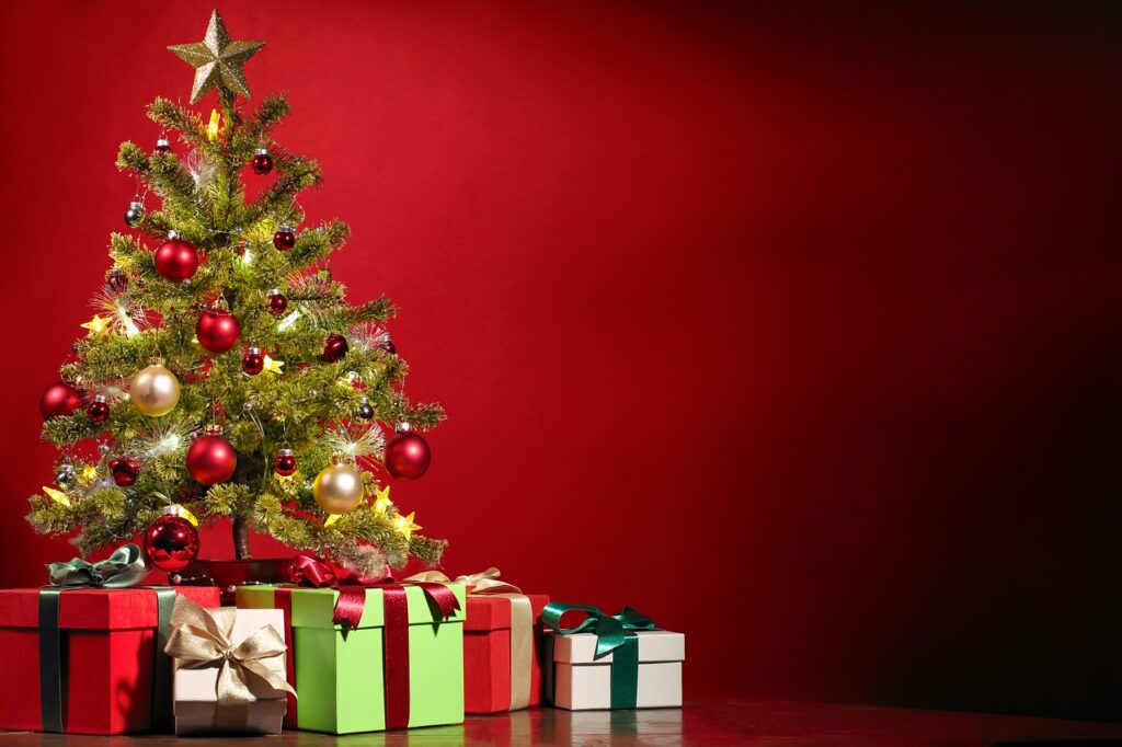 Weihnachtsbaum Geschenke roter Hintergrund Zauberhafte Weihnachtsgeschenke Geschenkideen für Kinder zu Weihnachten